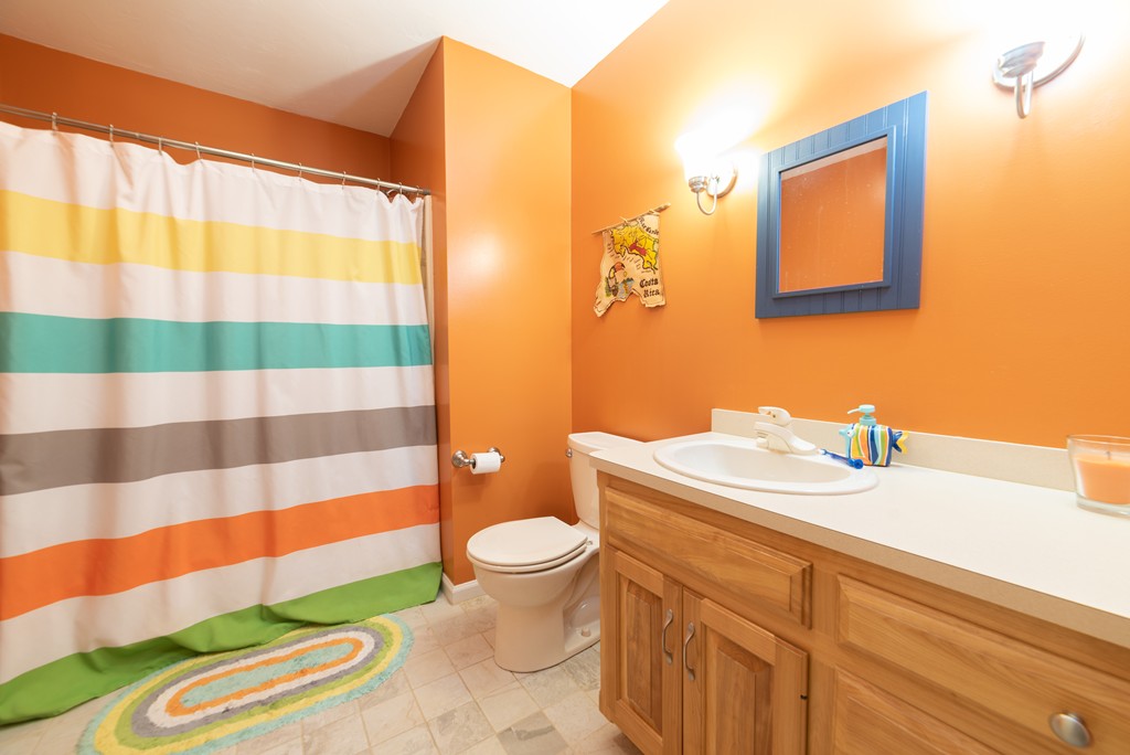 1565 West Street Wrentham, MA 02093 - Photo 22 of 30 a bathroom with a sink toilet and shower