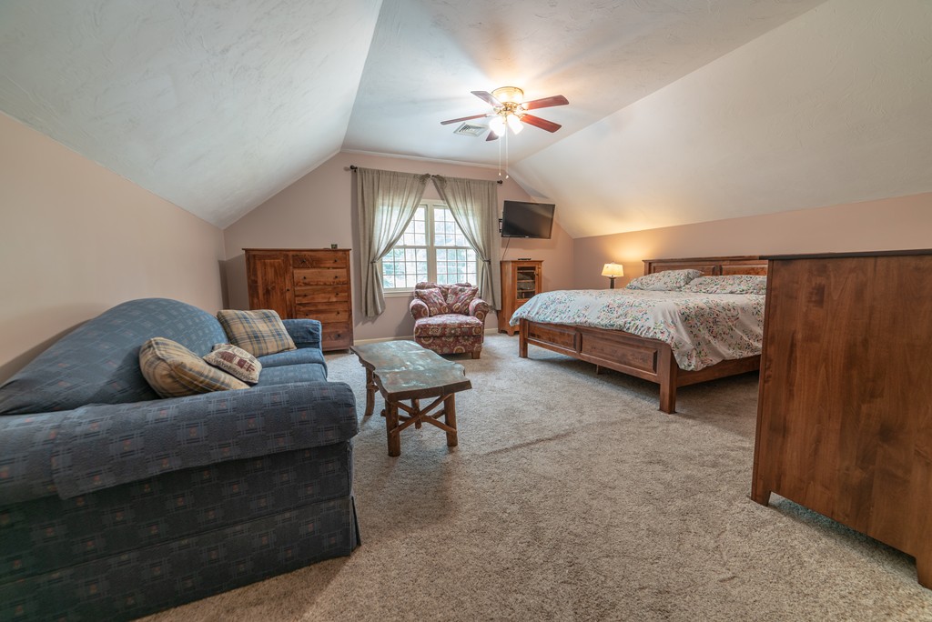 1565 West Street Wrentham, MA 02093 - Photo 23 of 30 a bedroom with bed and window