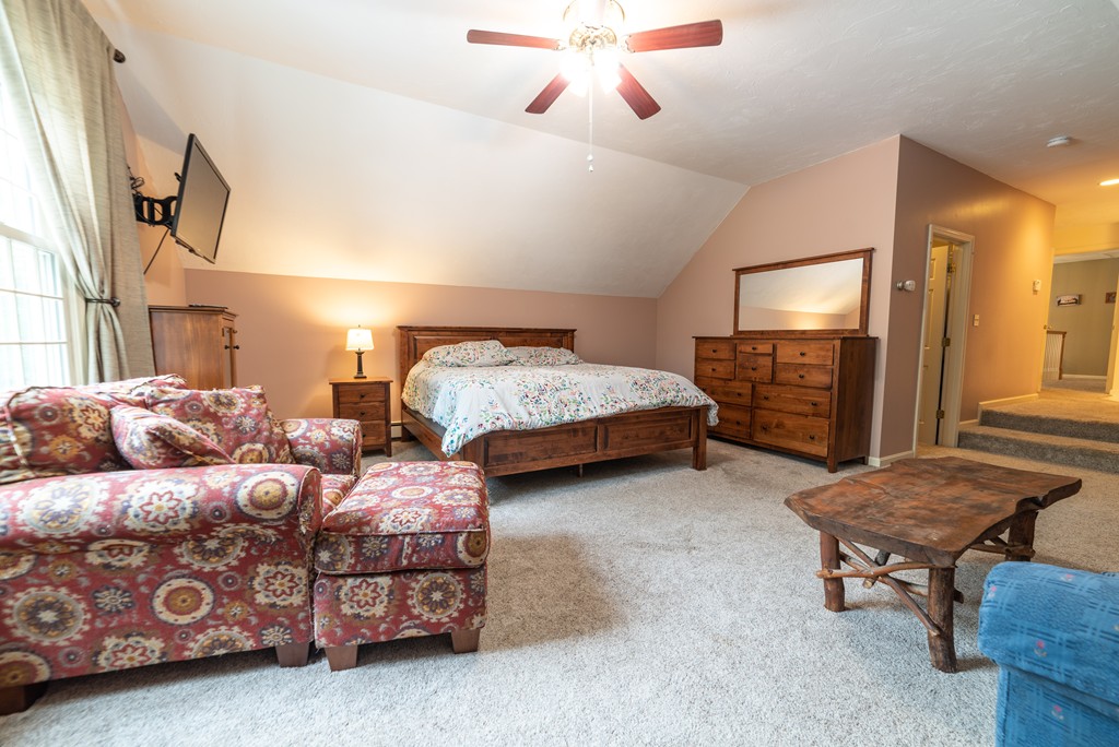 1565 West Street Wrentham, MA 02093 - Photo 24 of 30 a bedroom with bed and window