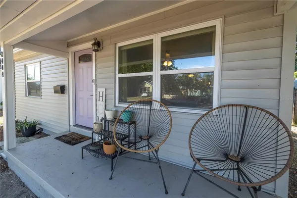 a view of balcony with chairs