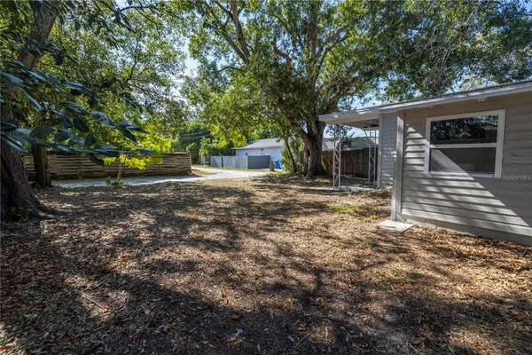 a house with trees in front of it