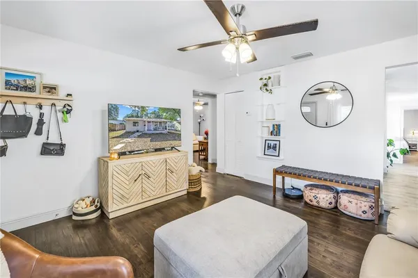a living room with furniture and a window