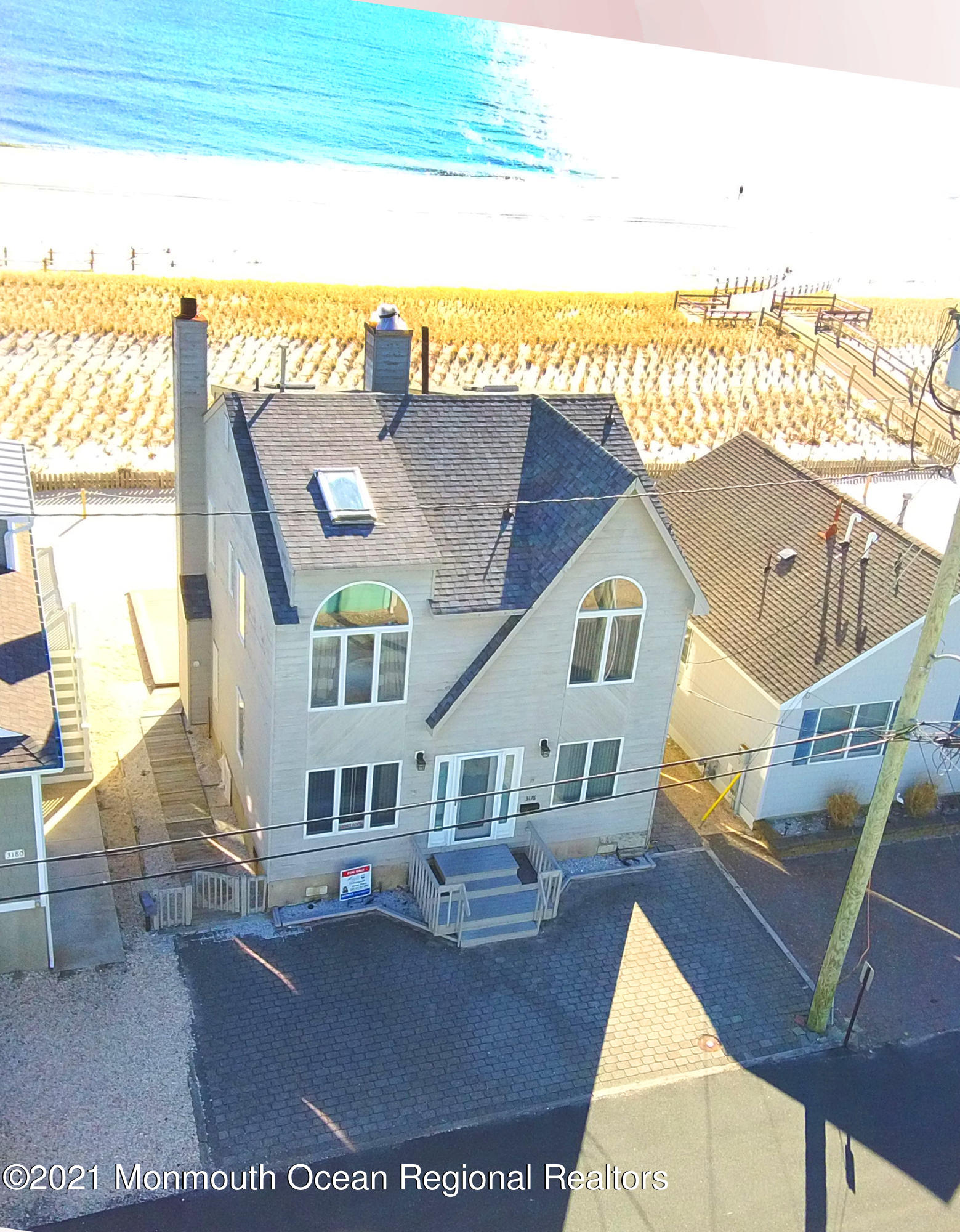 3176 Ocean Road Lavallette, NJ 08735 - Photo 2 of 39 a front view of a house with a ocean view