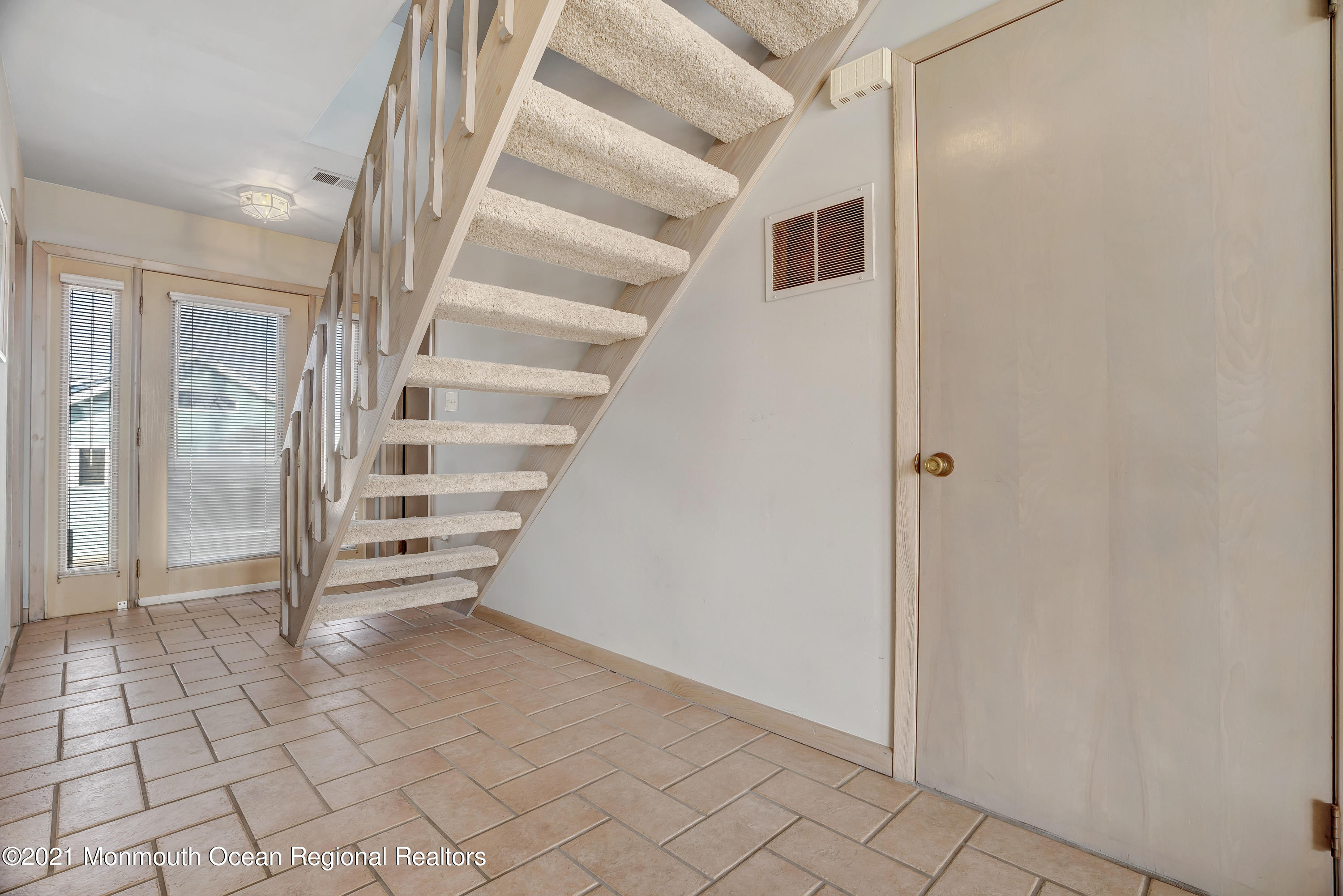 3176 Ocean Road Lavallette, NJ 08735 - Photo 20 of 39 a view of entryway and hall with a window