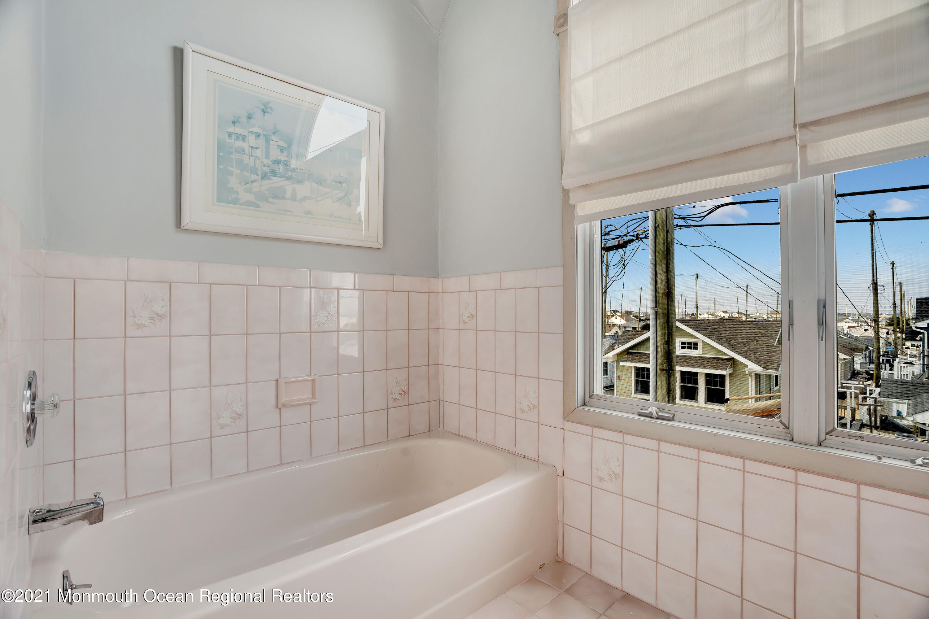 3176 Ocean Road Lavallette, NJ 08735 - Photo 36 of 39 a bathroom with a bathtub and a shower