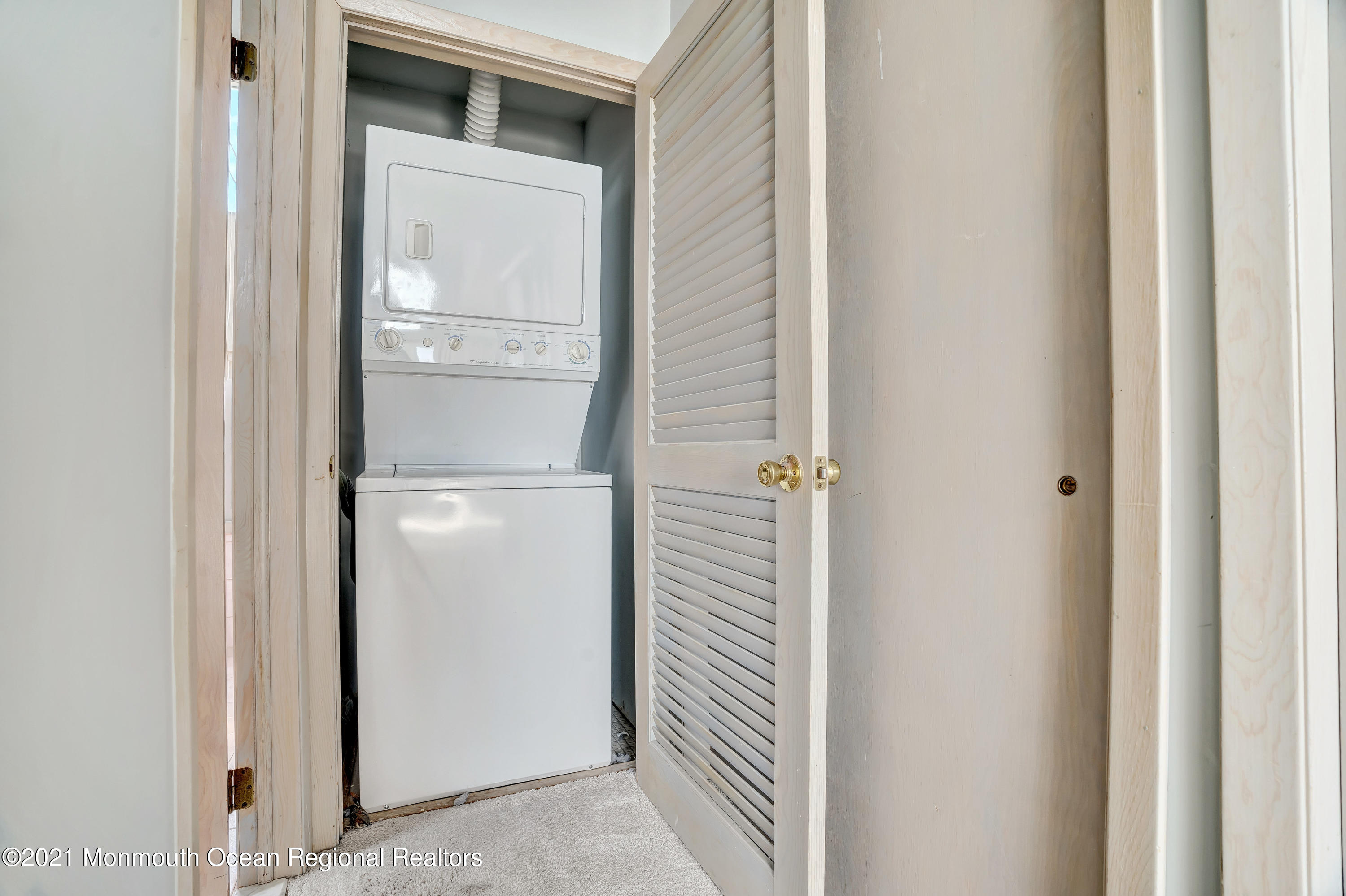 3176 Ocean Road Lavallette, NJ 08735 - Photo 37 of 39 a bathroom with a glass shower door