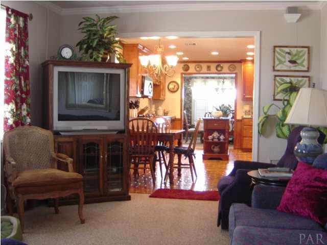 8855 Burning Tree Road Pensacola, FL 32514 - Photo 11 of 24 Family room looking back to kitchen.
