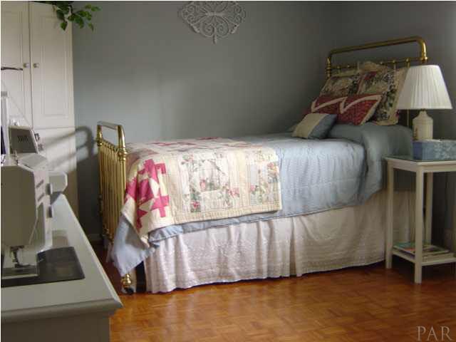 8855 Burning Tree Road Pensacola, FL 32514 - Photo 19 of 24 Third bedroom has wood floor & its own bath with shower.
