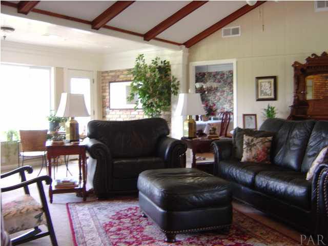 8855 Burning Tree Road Pensacola, FL 32514 - Photo 2 of 24 Cathedral ceiling with wood beams.