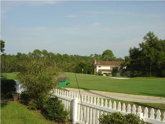 8855 Burning Tree Road Pensacola, FL 32514 - Photo 24 of 24 Over the white picket fence you can visit with your neighbors as they play.