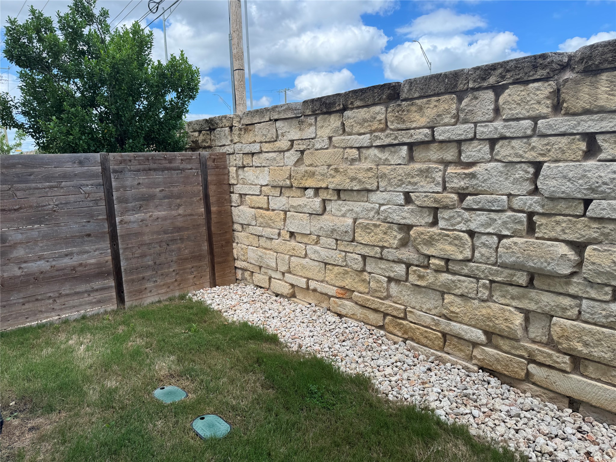 3000 Chisholm Trail Road, Unit 3 Round Rock, TX 78681 - Photo 28 of 28 a view of a backyard with wooden fence