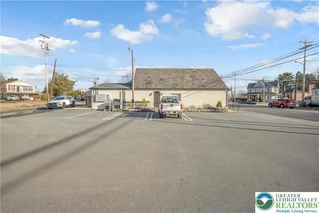 a view of house along the street