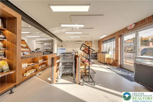 a view of a living room and entry way