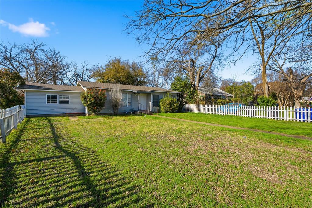 3329 Cumberland Avenue Waco, TX 76708 - Photo 7 of 8 a view of a house with a big yard