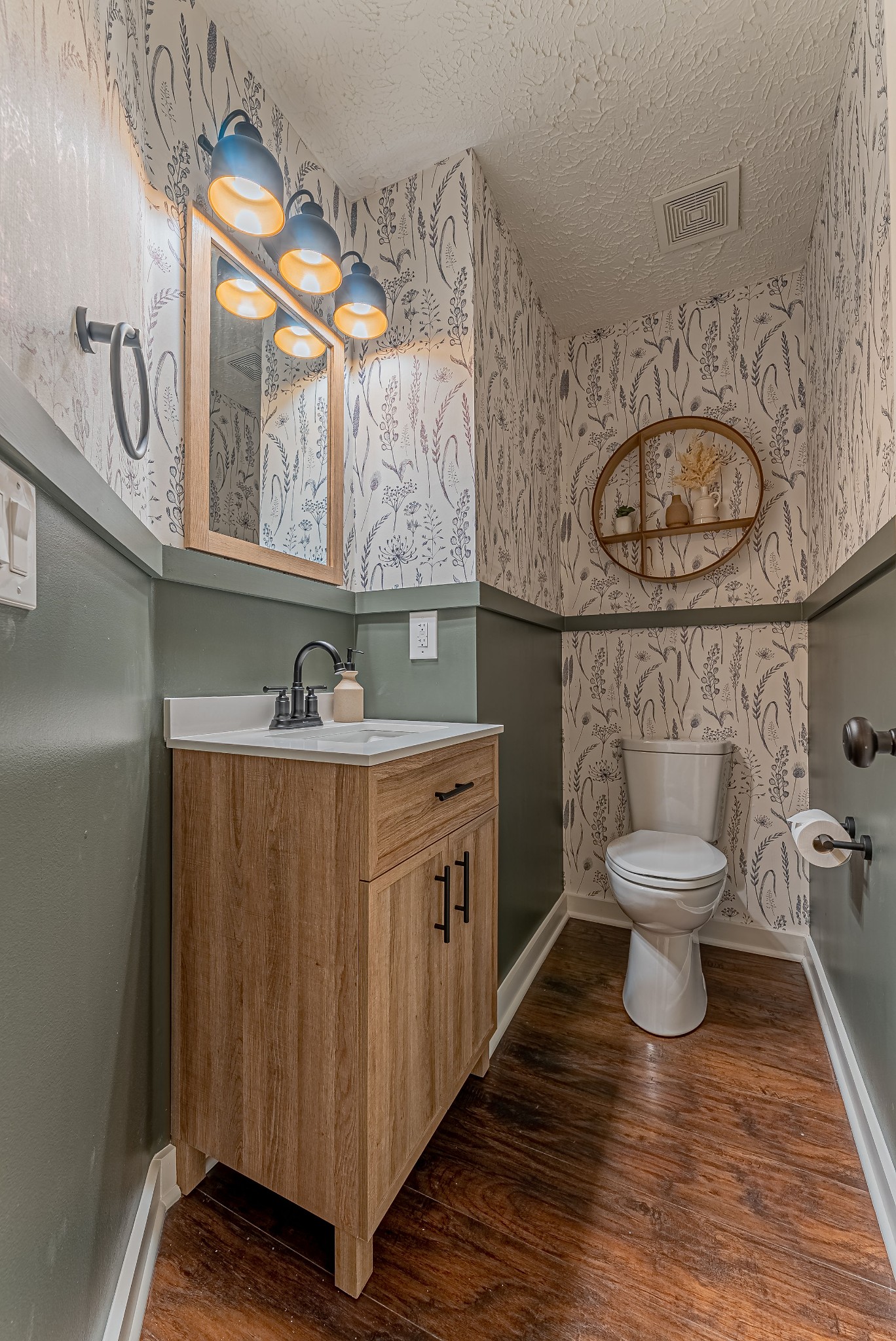 423 Compton Lane Franklin, TN 37069 - Photo 12 of 30 a bathroom with a toilet a sink and a mirror