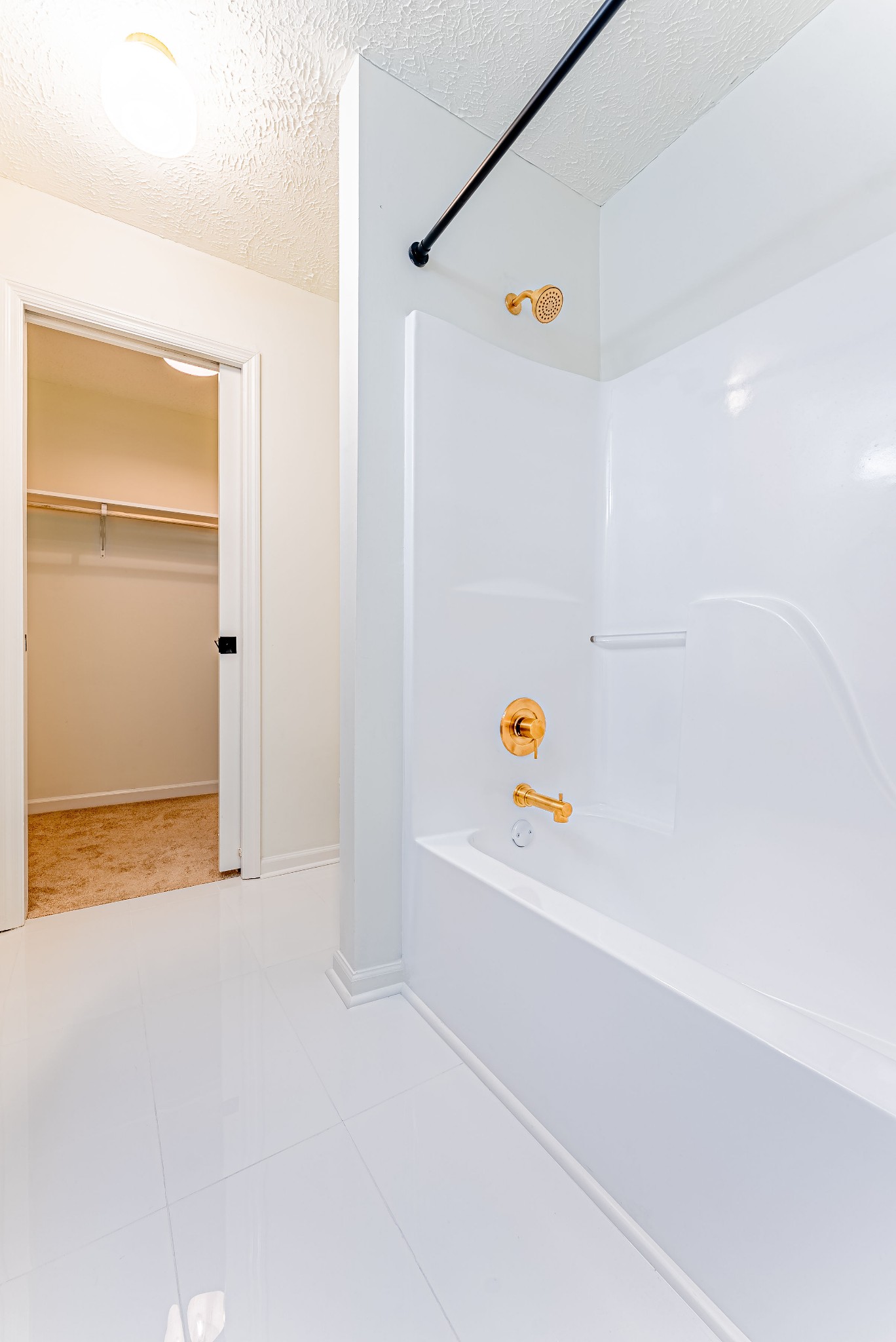 423 Compton Lane Franklin, TN 37069 - Photo 26 of 30 a bathroom with a bathtub and a shower