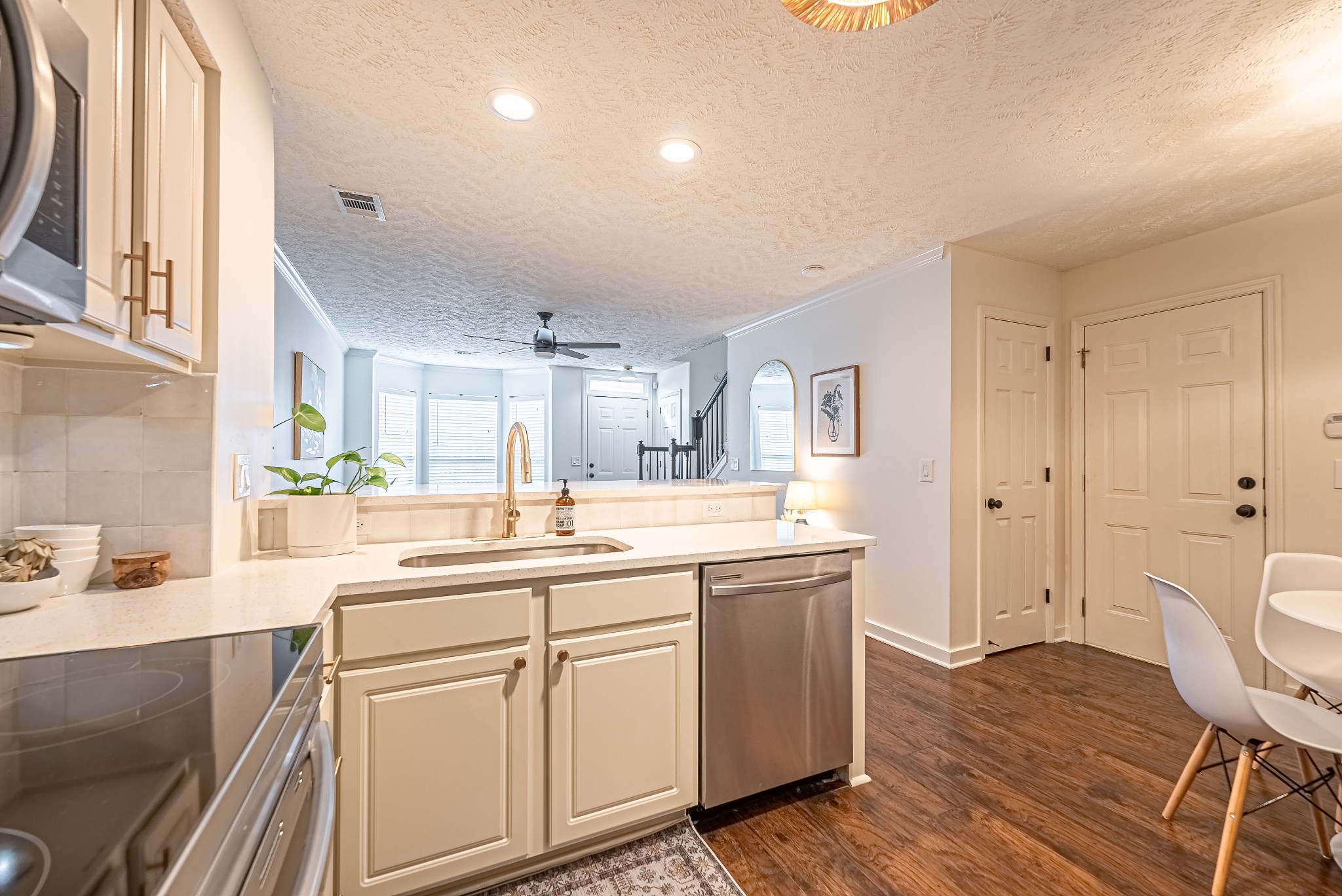 423 Compton Lane Franklin, TN 37069 - Photo 10 of 30 a kitchen with a sink cabinets and wooden floor
