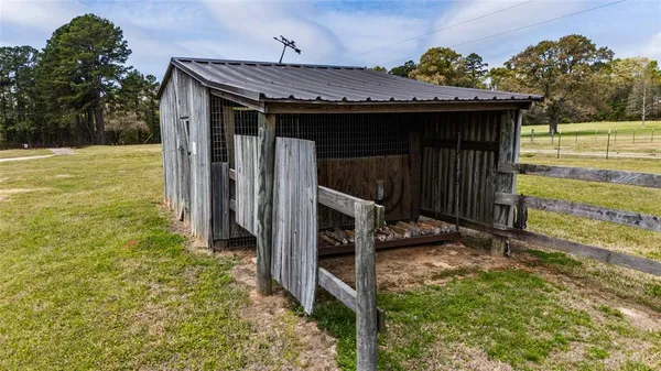 a view of a water fountain and a lawn chairs