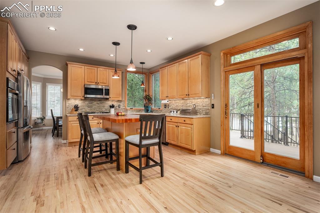 15580 Deercross Court Colorado Springs, CO 80921 - Photo 15 of 50 Gourmet kitchen with access to back deck