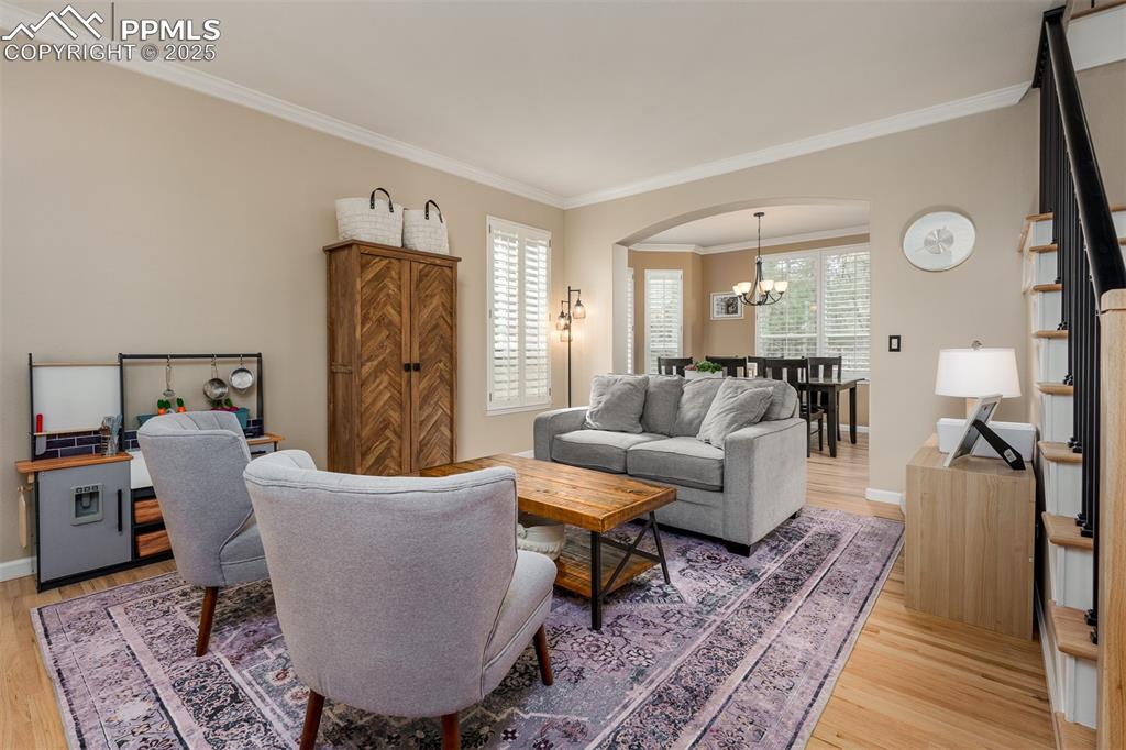 15580 Deercross Court Colorado Springs, CO 80921 - Photo 22 of 50 a living room with furniture and a rug