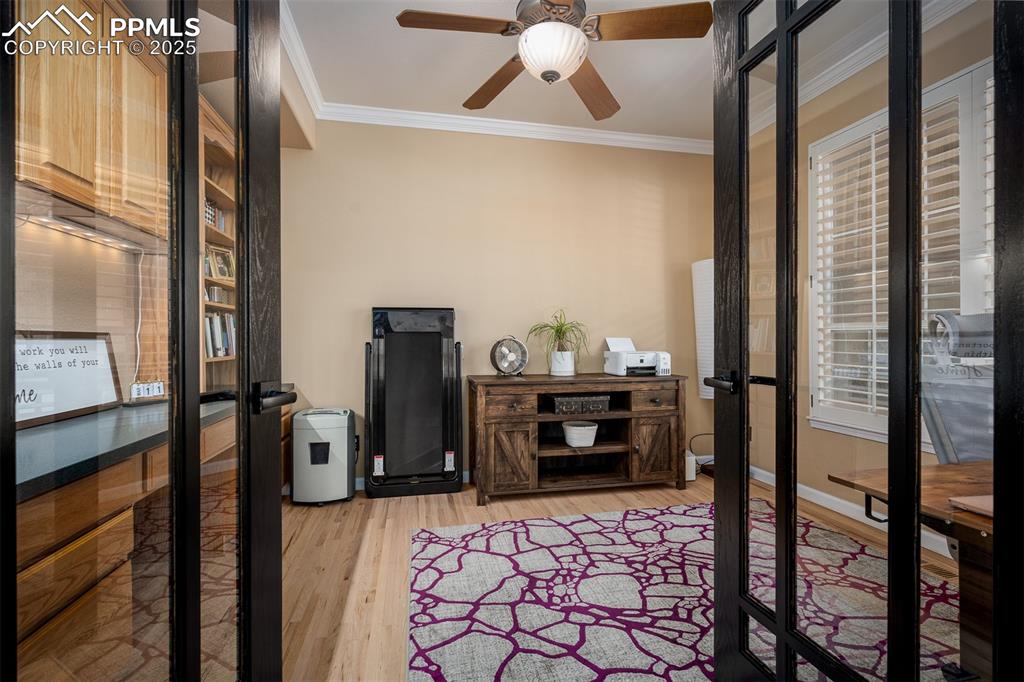 15580 Deercross Court Colorado Springs, CO 80921 - Photo 26 of 50 a view of a livingroom with furniture and a fireplace