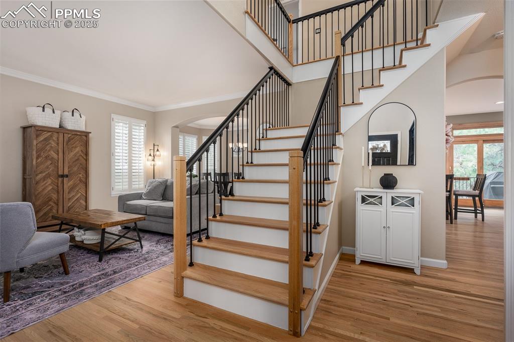 15580 Deercross Court Colorado Springs, CO 80921 - Photo 28 of 50 a view of entryway and hall with wooden floor