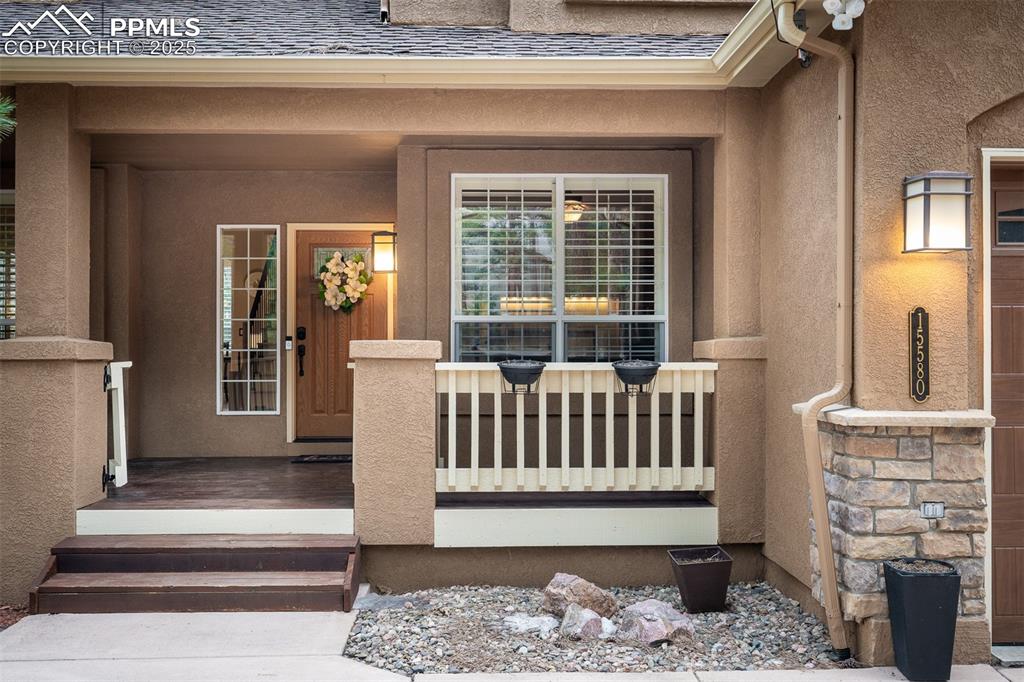 15580 Deercross Court Colorado Springs, CO 80921 - Photo 7 of 50 a view of a entryway door of the house