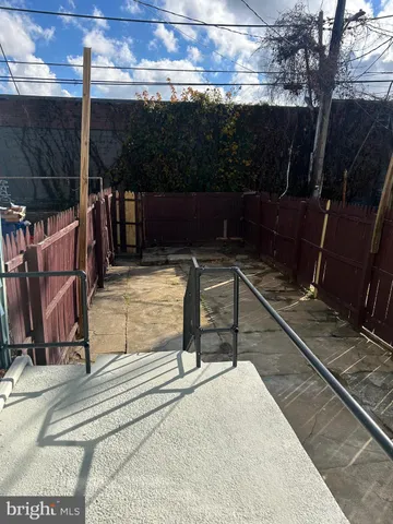 a view of a backyard with a slide