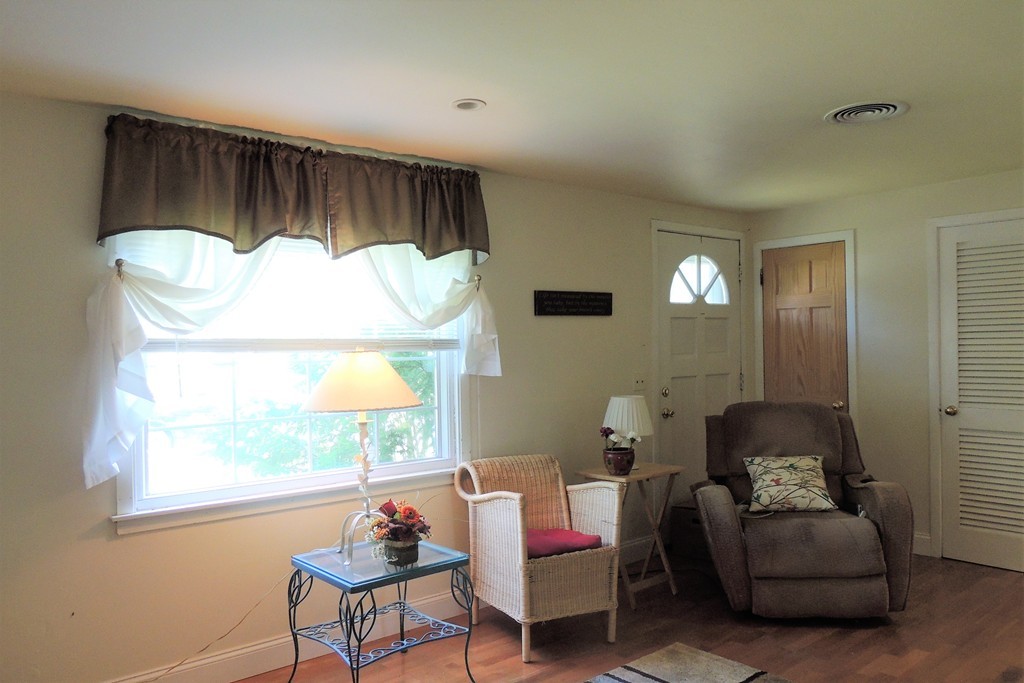 20 Keddy Street Springfield, MA 01109 - Photo 11 of 17 a living room with furniture and a window