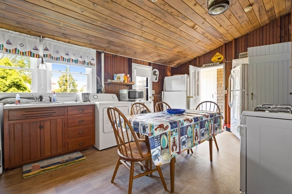 7 Pequod Lane Wareham, MA 02532 - Photo 13 of 26 a dining room with furniture and window