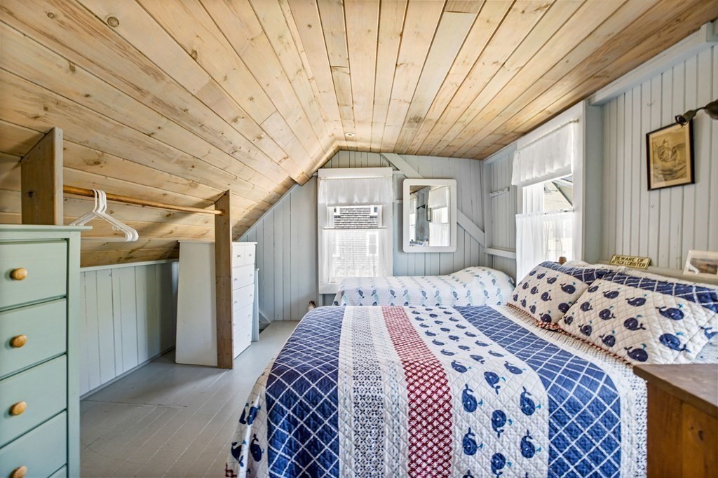 7 Pequod Lane Wareham, MA 02532 - Photo 18 of 26 a bedroom with a bed and a window