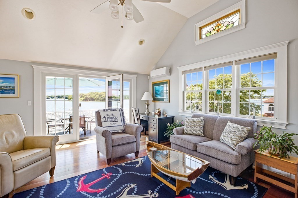 7 Pequod Lane Wareham, MA 02532 - Photo 19 of 26 a living room with furniture and a large window