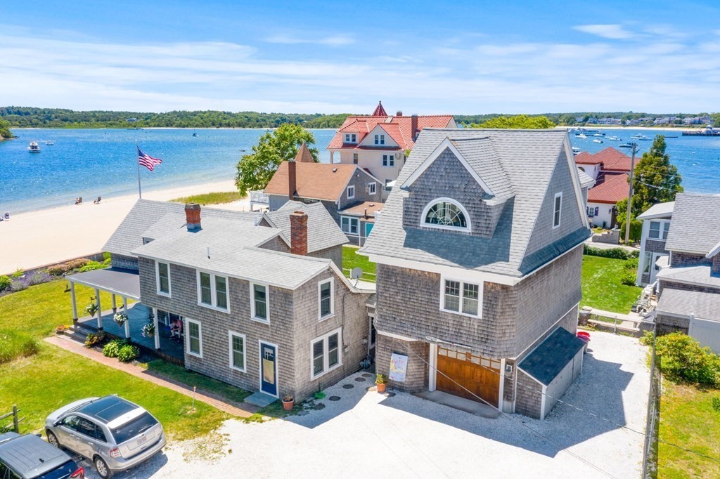 7 Pequod Lane Wareham, MA 02532 - Photo 2 of 26 a aerial view of a house with swimming pool outdoor seating
