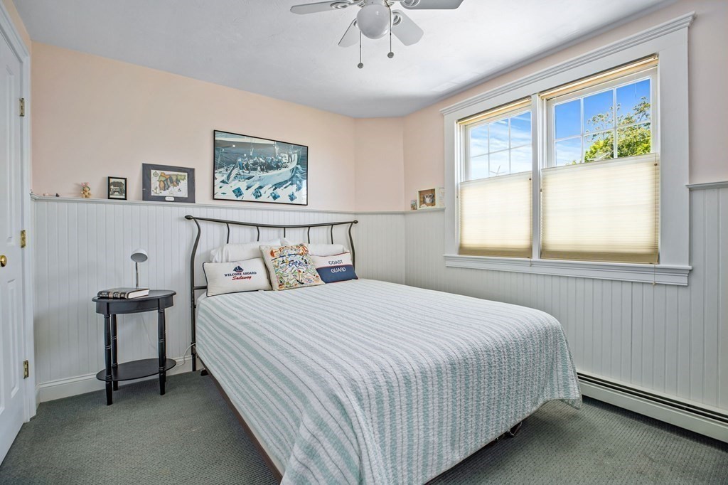 7 Pequod Lane Wareham, MA 02532 - Photo 21 of 26 a bedroom with a bed and a window