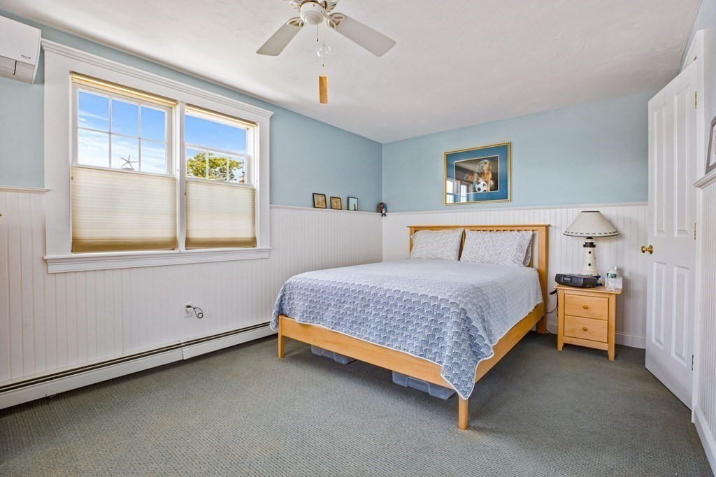 7 Pequod Lane Wareham, MA 02532 - Photo 22 of 26 a bedroom with a bed and window