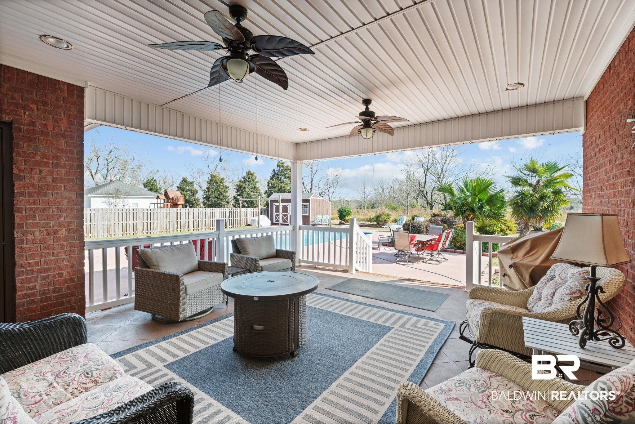 4771 Pecan Ridge East Mobile, AL 36619 - Photo 13 of 48 View of patio with an outdoor living space, a ceiling fan, and a shed