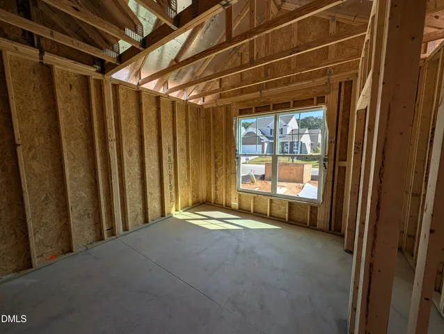 a view of a room with large windows
