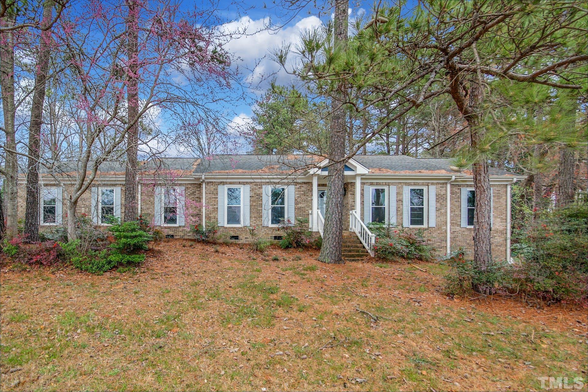 9208 Leesville Road Raleigh, NC 27613 - Photo 1 of 25 a front view of house with yard outdoor seating and barbeque oven