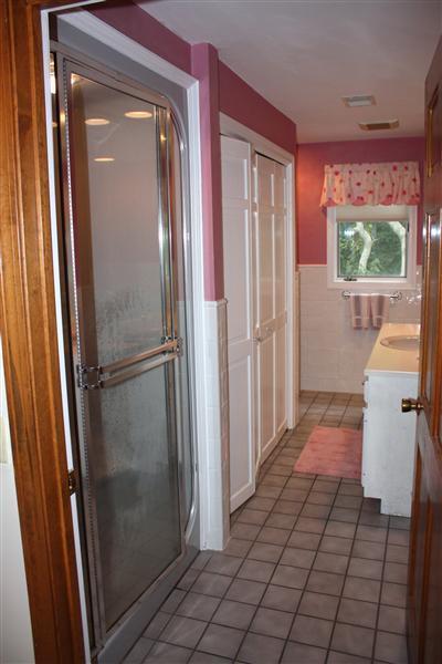 360 Lower County Road Harwich Port, MA 02646 - Photo 19 of 33 a bathroom with a glass door shower and a sink