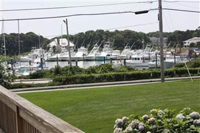 360 Lower County Road Harwich Port, MA 02646 - Photo 2 of 33 a view of a lake from a balcony