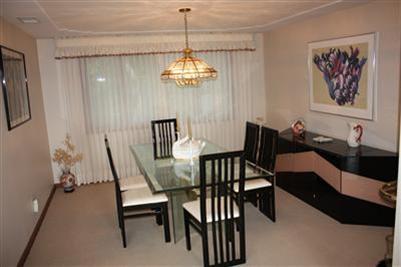 360 Lower County Road Harwich Port, MA 02646 - Photo 8 of 33 a view of a dining room with furniture a chandelier and wooden floor