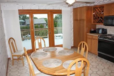 360 Lower County Road Harwich Port, MA 02646 - Photo 10 of 33 a dining room with furniture and a window