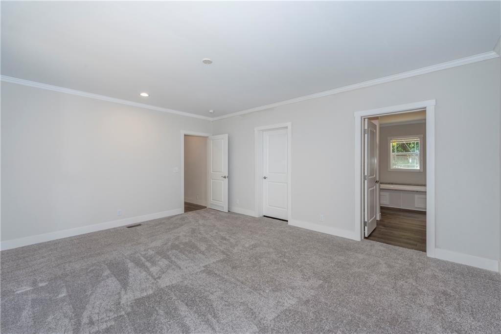 10209 Kelly Bridge Road Dawsonville, GA 30534 - Photo 22 of 31 a view of an empty room