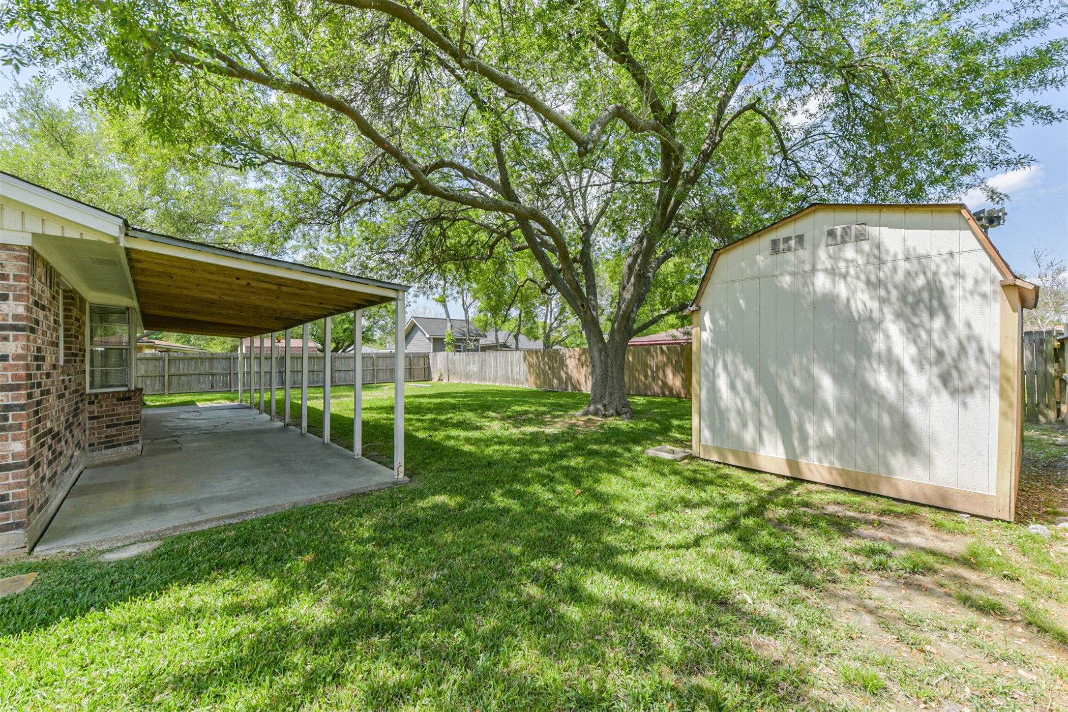 2415 Heather Street Highlands, TX 77562 - Photo 18 of 29 HUGE BACKYARD AND SHED WITH NEW ROOF