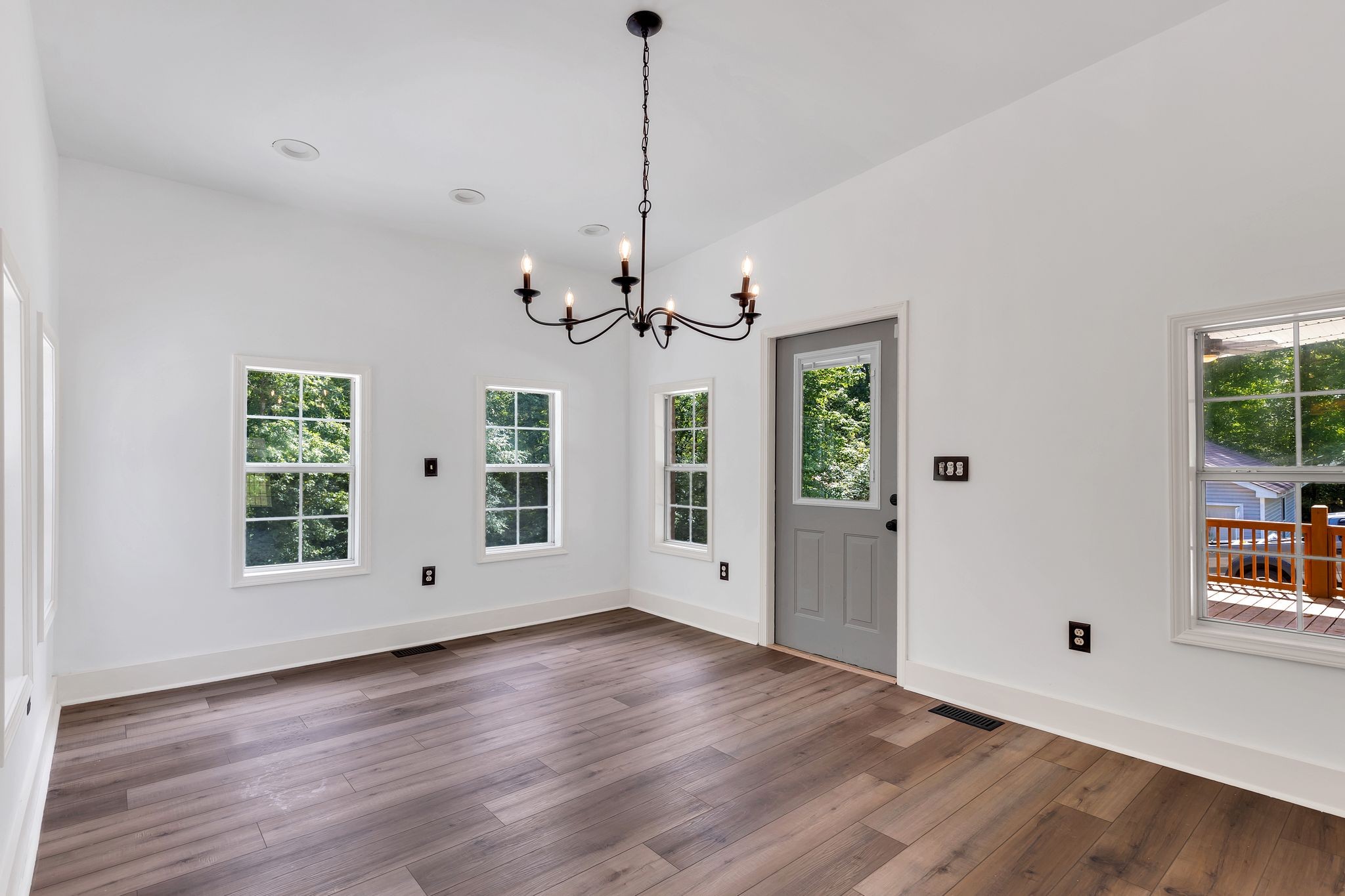 1450 Southside Road Southside, TN 37171 - Photo 16 of 41 a view of an empty room with wooden floor and a window