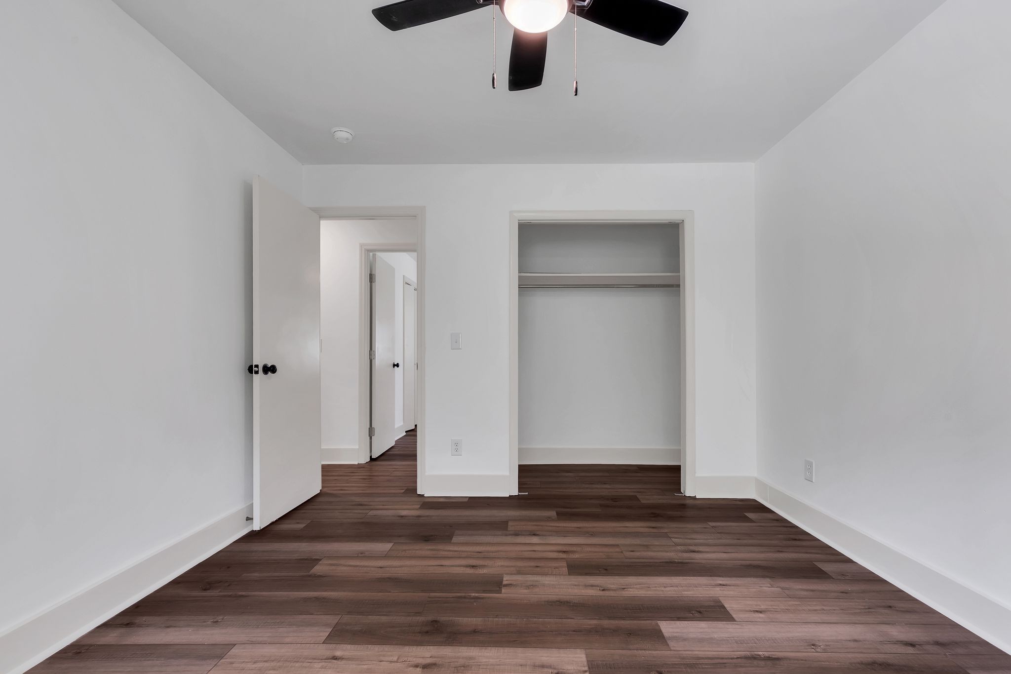 1450 Southside Road Southside, TN 37171 - Photo 25 of 41 a view of an empty room and wooden floor