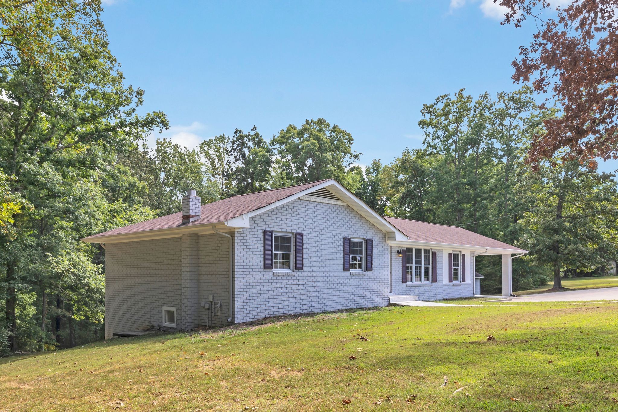 1450 Southside Road Southside, TN 37171 - Photo 3 of 41 a front view of a house with a garden