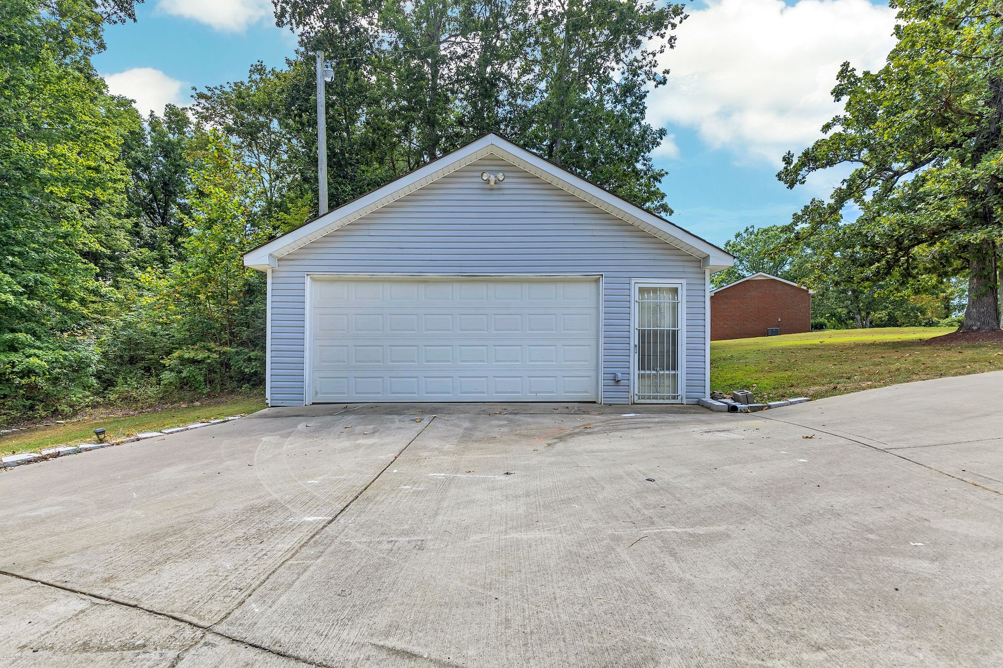 1450 Southside Road Southside, TN 37171 - Photo 38 of 41 a view of garage yard and tree