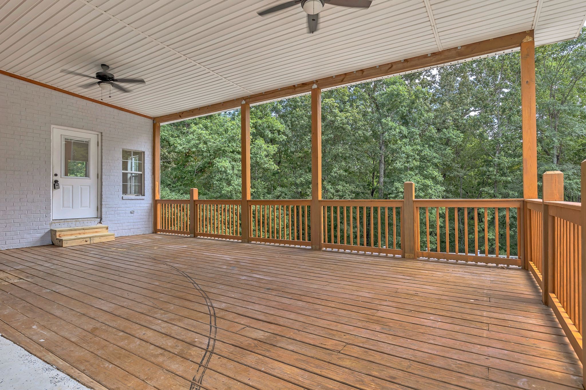 1450 Southside Road Southside, TN 37171 - Photo 40 of 41 a view of a room with wooden floor and walls