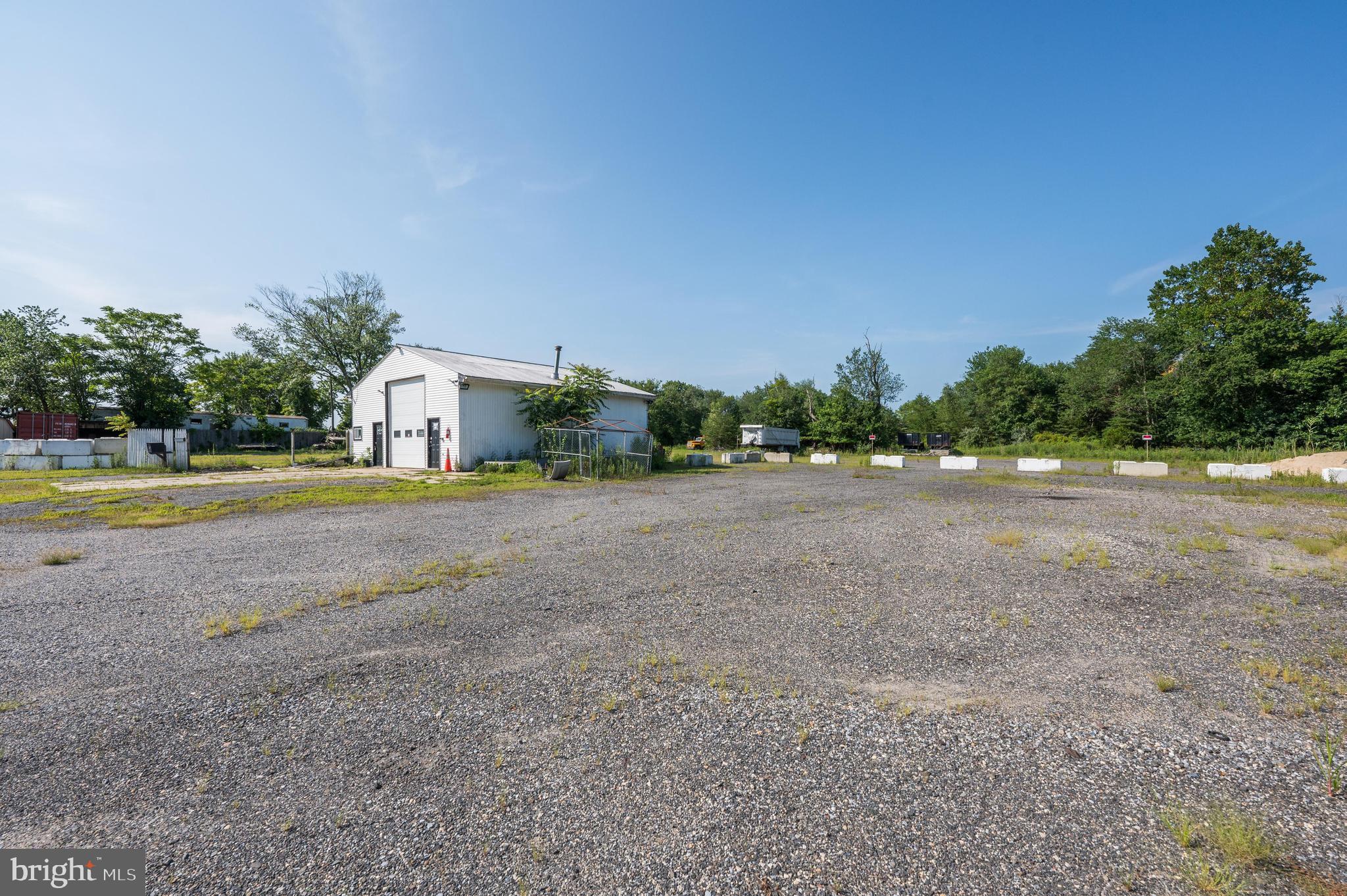 773 Watsontown Road Berlin, NJ 08009 - Photo 16 of 20 a view of big house with yard and trees in the background